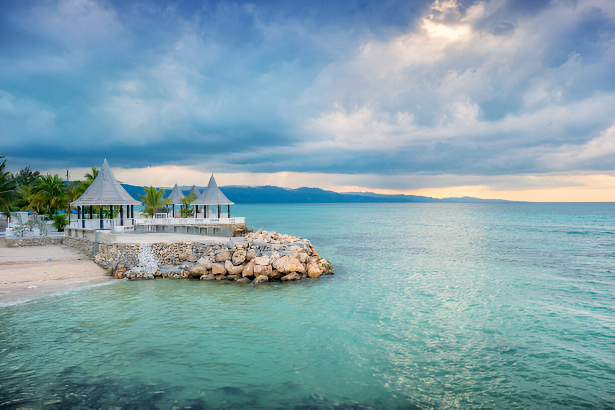 Gazebos at SeaGarden Beach Resort in Montego Bay Jamaica on a cloudy day.